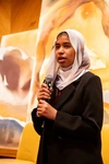 A young person speaking at a convening by the Mastercard Foundations with Sudanese youth-led organizations at UNGA 80