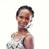 Sandra Nabulega, Mastercard Foundation Scholar, smiles to camera