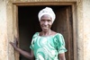 Joseph’s mother, Beatrice standing in the doorway of Joseph’s childhood home. 