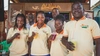 Lucy Aciro with others at her juice stall
