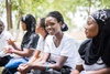 A group of women smiling.