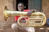 One of the COBURWAS School musicians, Safari arrived at Kyangwali alone with his father. He loves math and science.  