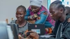 iamtheCODE women working on laptops.