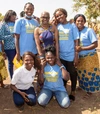 Group of people smiling to camera