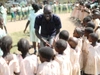 A teacher working with young children.