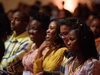 A group of young people smiling in an auditorium for the 2018 Baobab Summit, 4x3