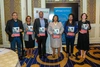 Partners pose for a photo during the launch of the Policy Guide for Digital Economy progress.