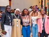 A group of young women in business casual clothing posing and smiling together at the 2025 Baobab Summit in Nairobi, Kenya, 4 x 3.