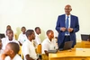 Joseph Nsengimana, Minister of Education from Rwanda speaking in a classroom in February 2025