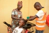 William with another hairdresser working on a clients hair