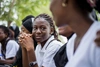 A group of students, one of whom is looking toward the camera. 