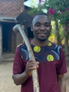 Fletcher Chinyama a young farmer from Musa Site in Zomba District, Malawi who enrolled in One Acre Fund's program to grow his business