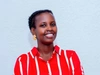 Faith Muhoza de MK Farms dans une chemise rouge à rayures blanches
