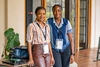 Two women smiling to camera