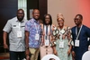 Mastercard Foundation representatives and Representatives of the World University Service of Canada (WUSC) gather for the photo smiling to camera