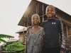 Odeta, 8, and her brother Manassé, 12, stand on their doorstep in Mugunga, near Goma, North Kivu province in DR Congo on December 3, 2024.