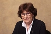 The Honourable Louise Arbour smiling to camera dressing smartly in a suit 