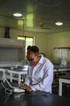 Mellisa Moyo working in the lab