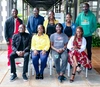 Group of people smiling to camera