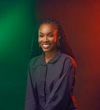 Hannah Rotimi-Williams Lead, Gender and Safeguarding in a dark blue button up shirt