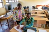 Pacifique Ndungutse (seated) a visually impaired student with Emmanuel Mberimana, an instructor at the School of Inclusive and Special Needs Education at the College of Education, University of Rwanda, Rukara Campus, Eastern Province.