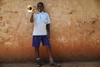 One of the COBURWAS School musicians, Musa loves to play the trumpet, the stick and the big drum.