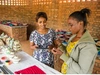 Alice Igiraneza interviews Peace Aradukunda, a young artisan at the Women's Opportunity Centre in Kayonza, Rwanda.