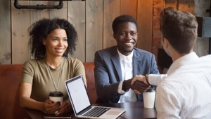 couple meeting with an adviser