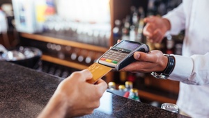 woman paying using credit card 
