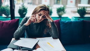 worried lady on the phone to bank