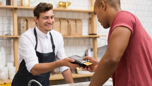 man using prepaid card 