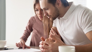 couple looking at paperwork