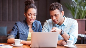 couple looking at laptop