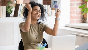 Young lady with laptop applying for a loan