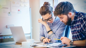couple working together at desk
