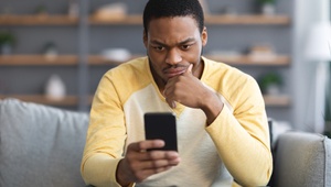 Man looking confused at phone