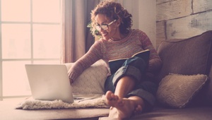woman looking on a laptop