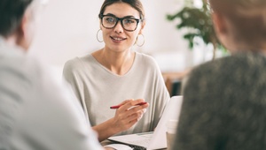 mortgage broker speaking to couple
