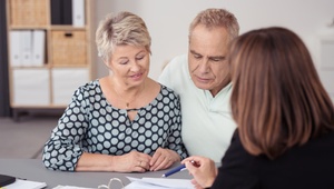 middle aged couple at bank