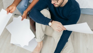 couple looking at bills