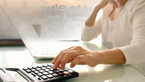 woman using a calculator