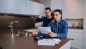 couple with bills