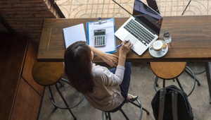 woman in cafe on laptop