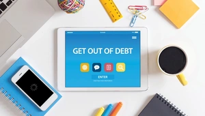 Get out of debt text displaying on tablet screen