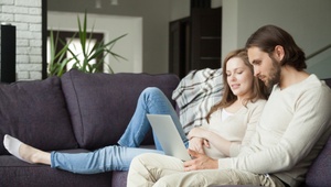 couple looking at laptop