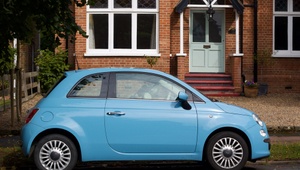 car parked outside of house