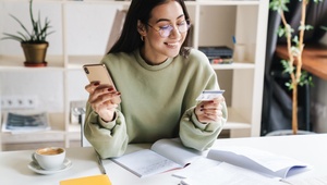happy girl with credit card