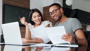 couple looking at paperwork together