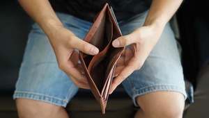 man with empty wallet