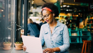 Woman browsing on laptop